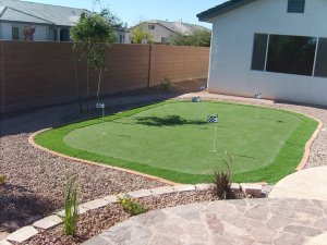 Adding artificial turf to this backyard.